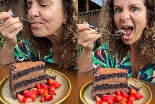 Luciana comendo bolo com prazer